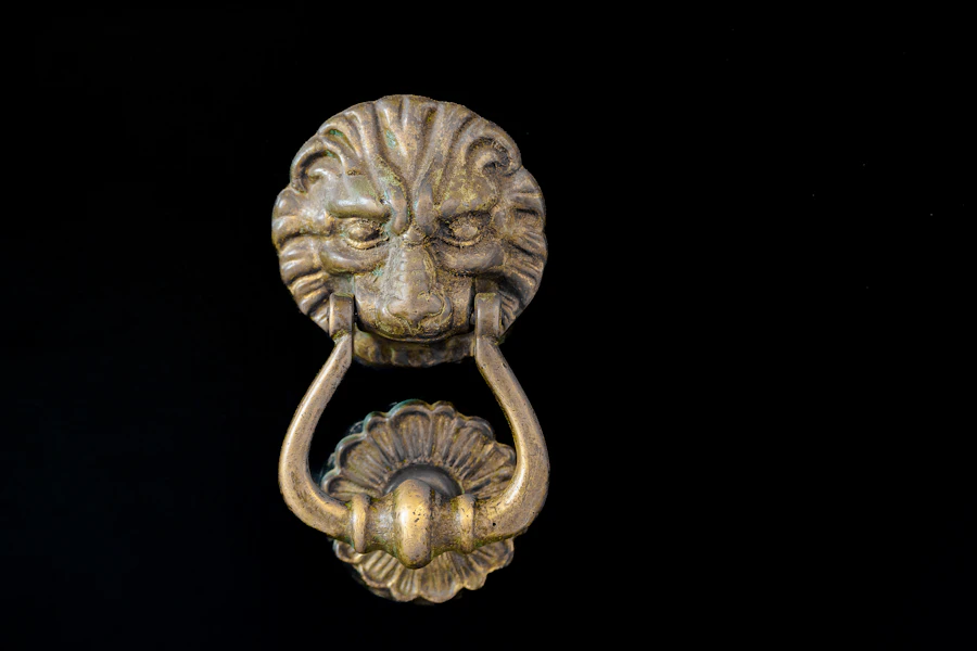 Antique brass lion head door knocker